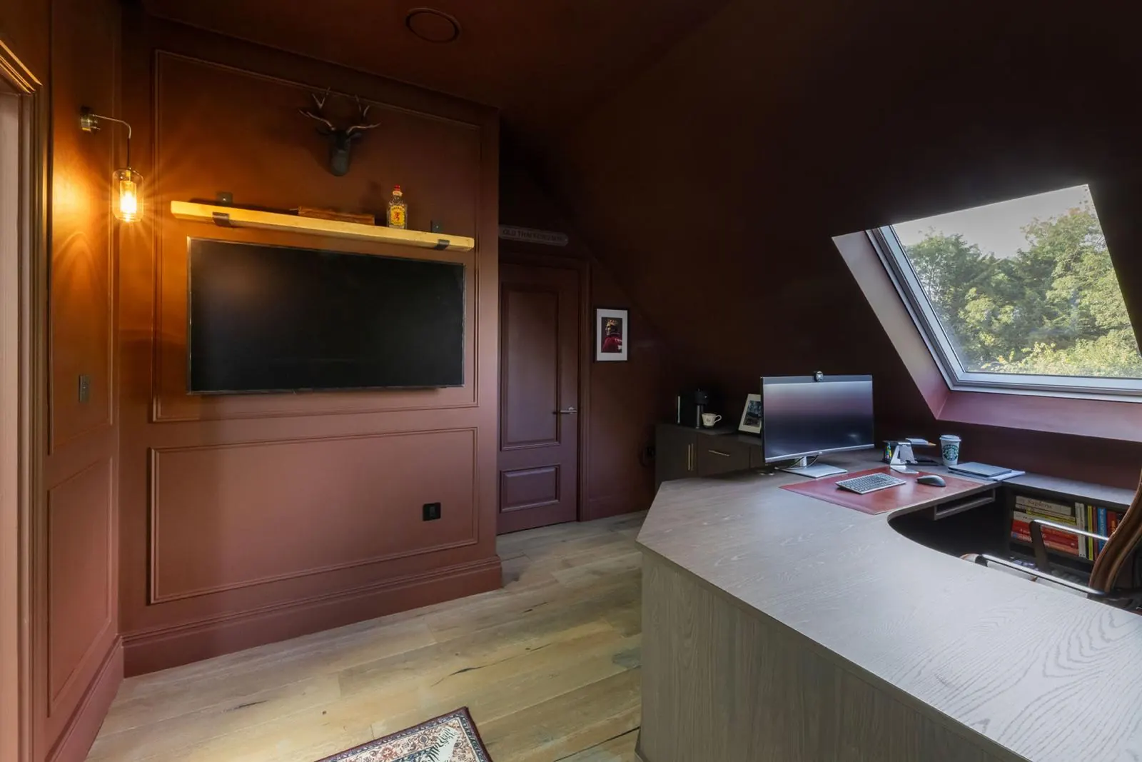 Loft cinema room with vaulted ceiling, Hertfordshire