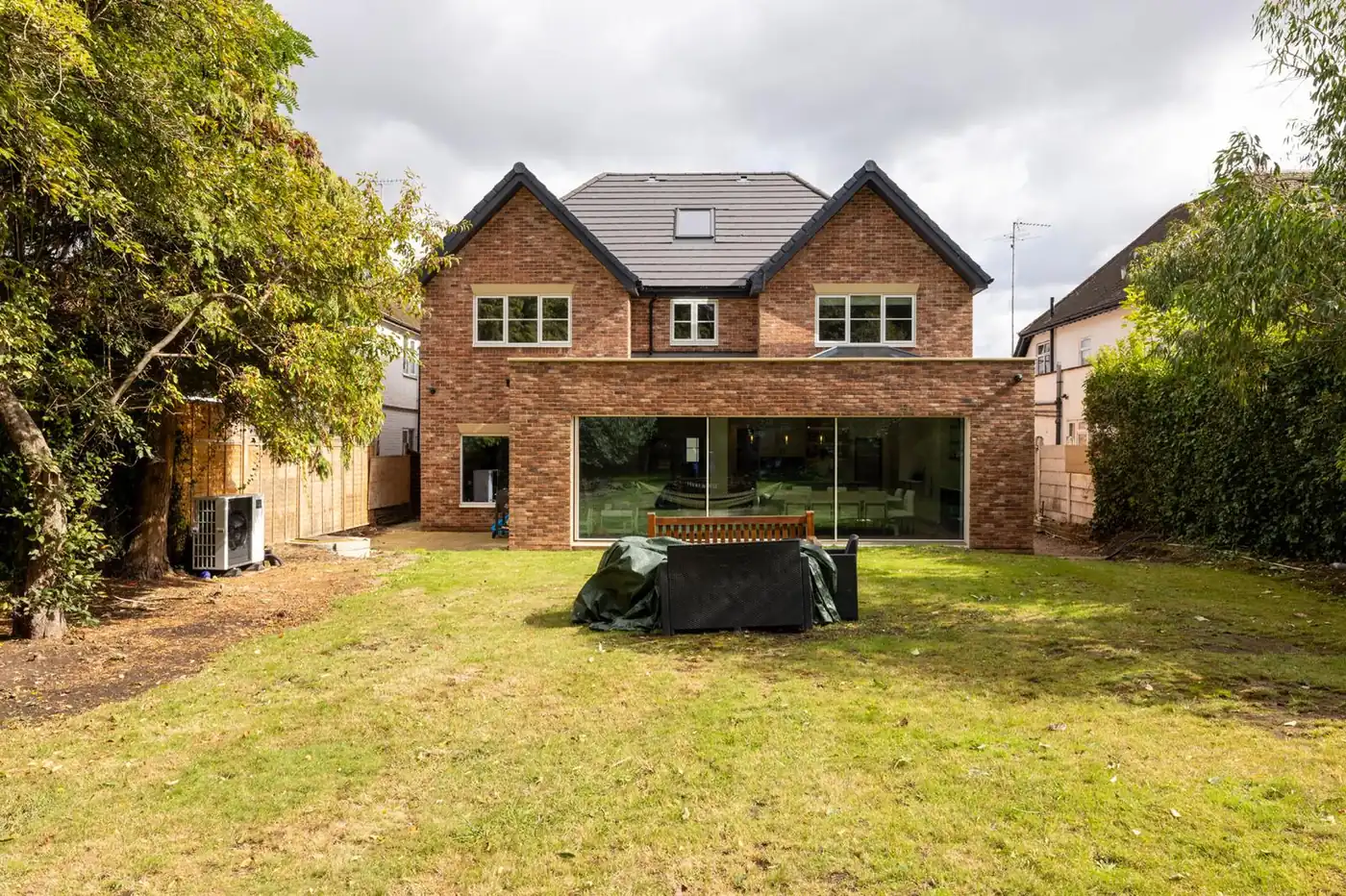 Full front exterior of a residential project with landscaped garden, Hertfordshire