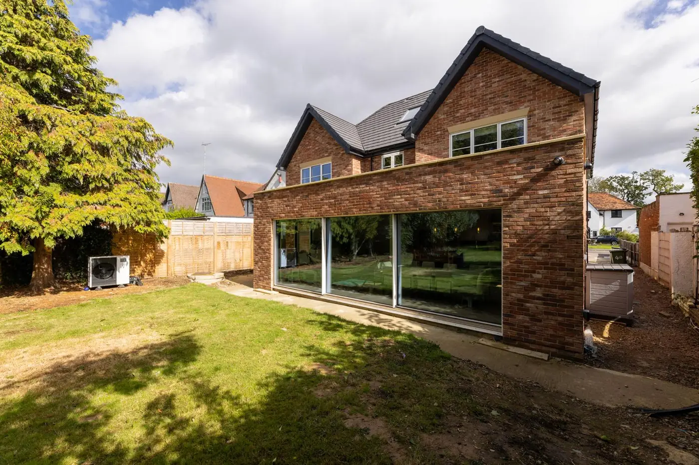 Brick exterior of a renovated house with private garden, Hertfordshire