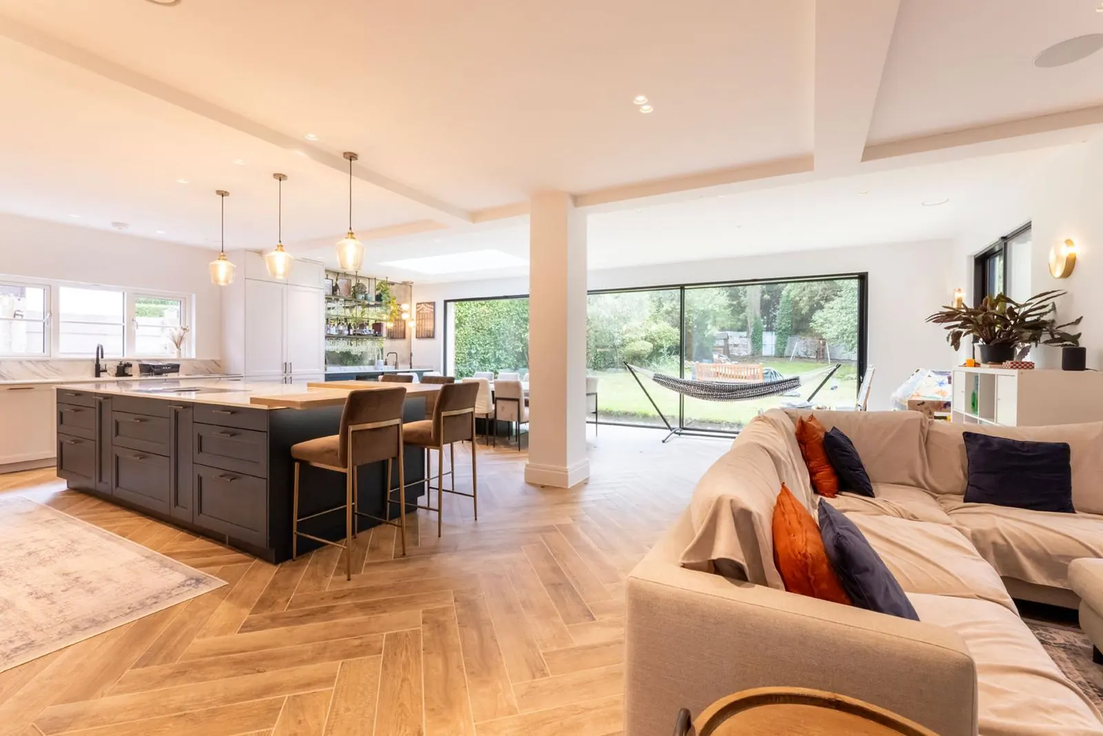 Open-plan kitchen with island and exposed beams, Hertfordshire