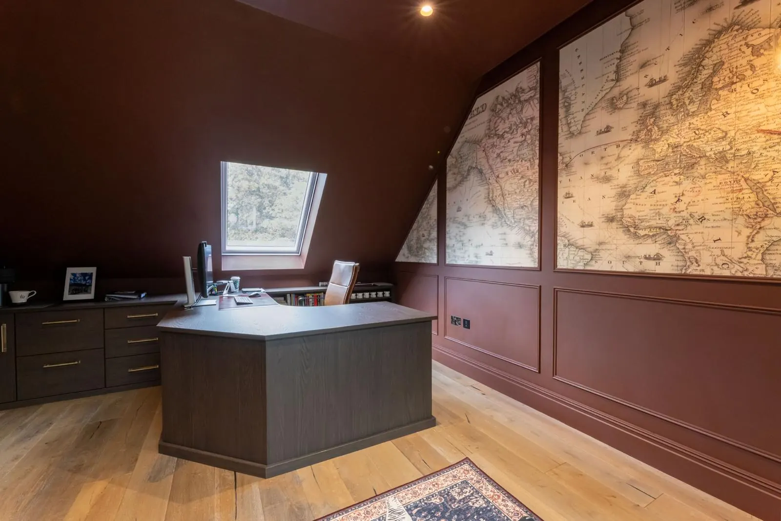 Loft conversion with herringbone flooring and built-in storage, Hertfordshire